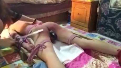 Chinese mistress spanking slave