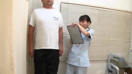 Japanese nurse enjoys while having clothed sex with her patient