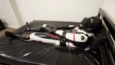 Rubber biker drone masturbation